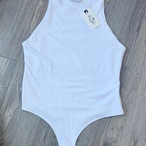 White women’s sleeveless body suit